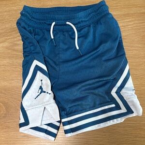 Youth boys Michael Jordan basketball shorts. Royal blue size small.